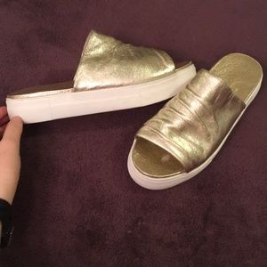 J/SLIDES gold platform sandals, 10